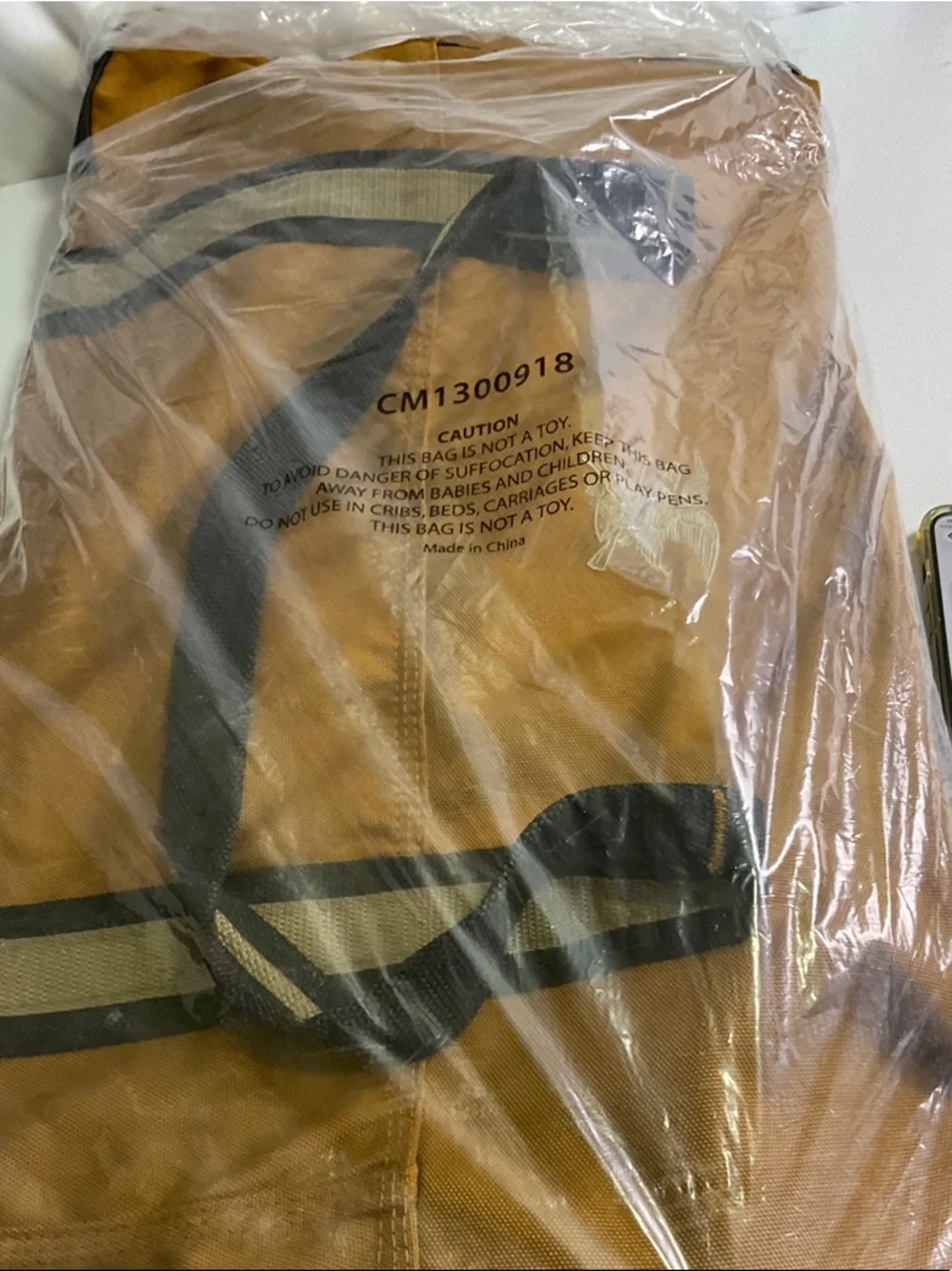 NRA SYMBOL Tan Canvas Duffel Bag with Navy Black Trim and Shoulder Strap